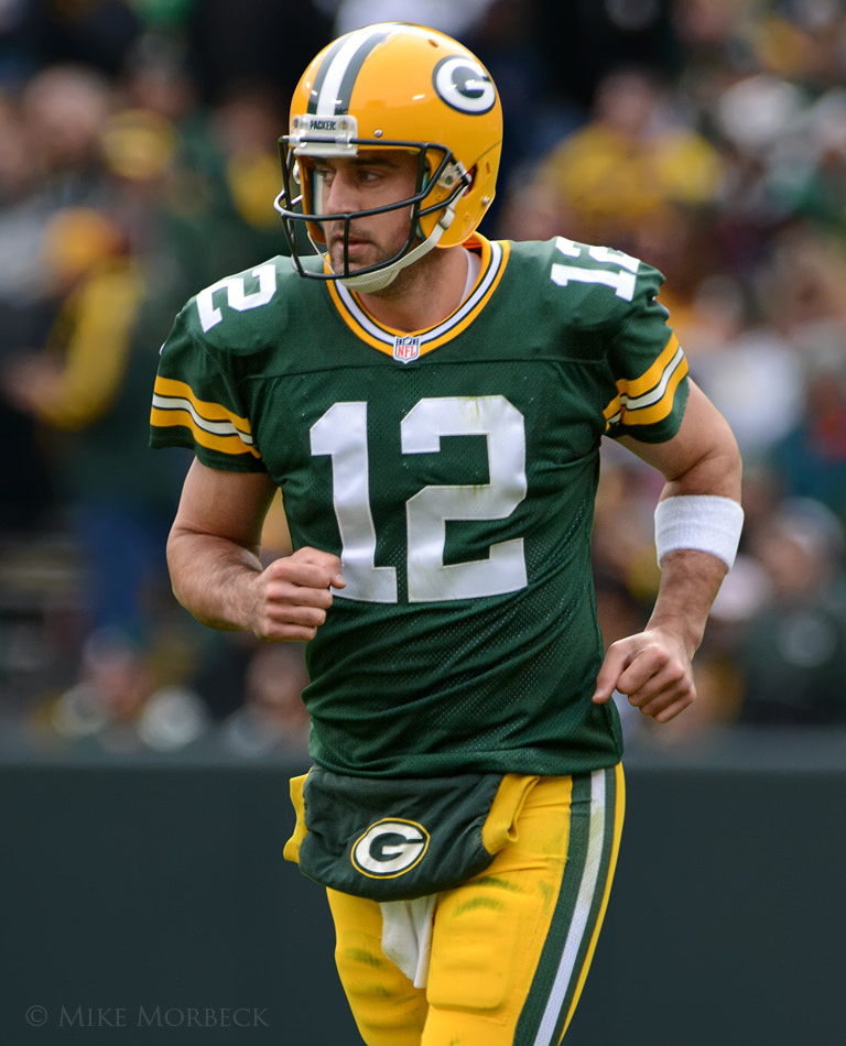 Football player Aaron Rodgers jogging