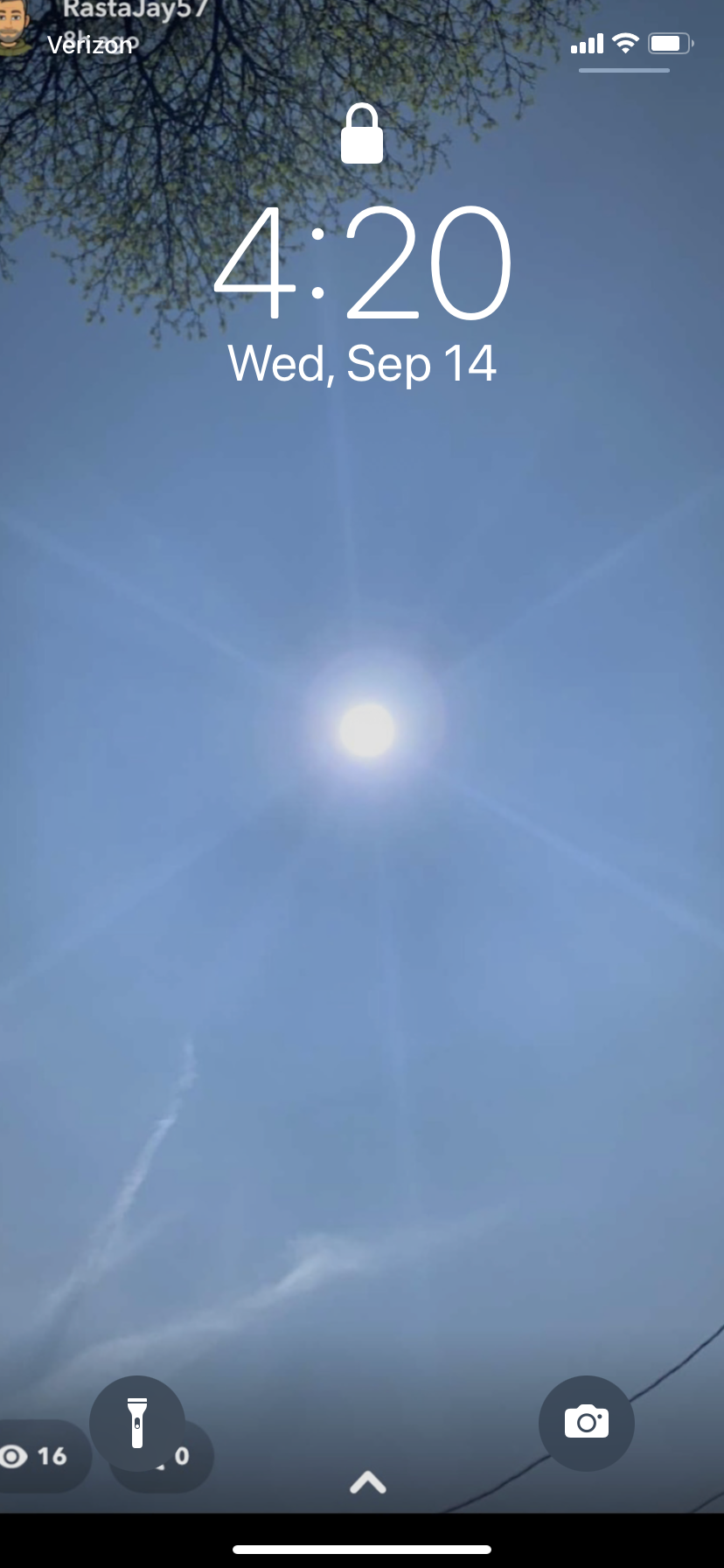 Blue sky, sun, and phone lock screen
